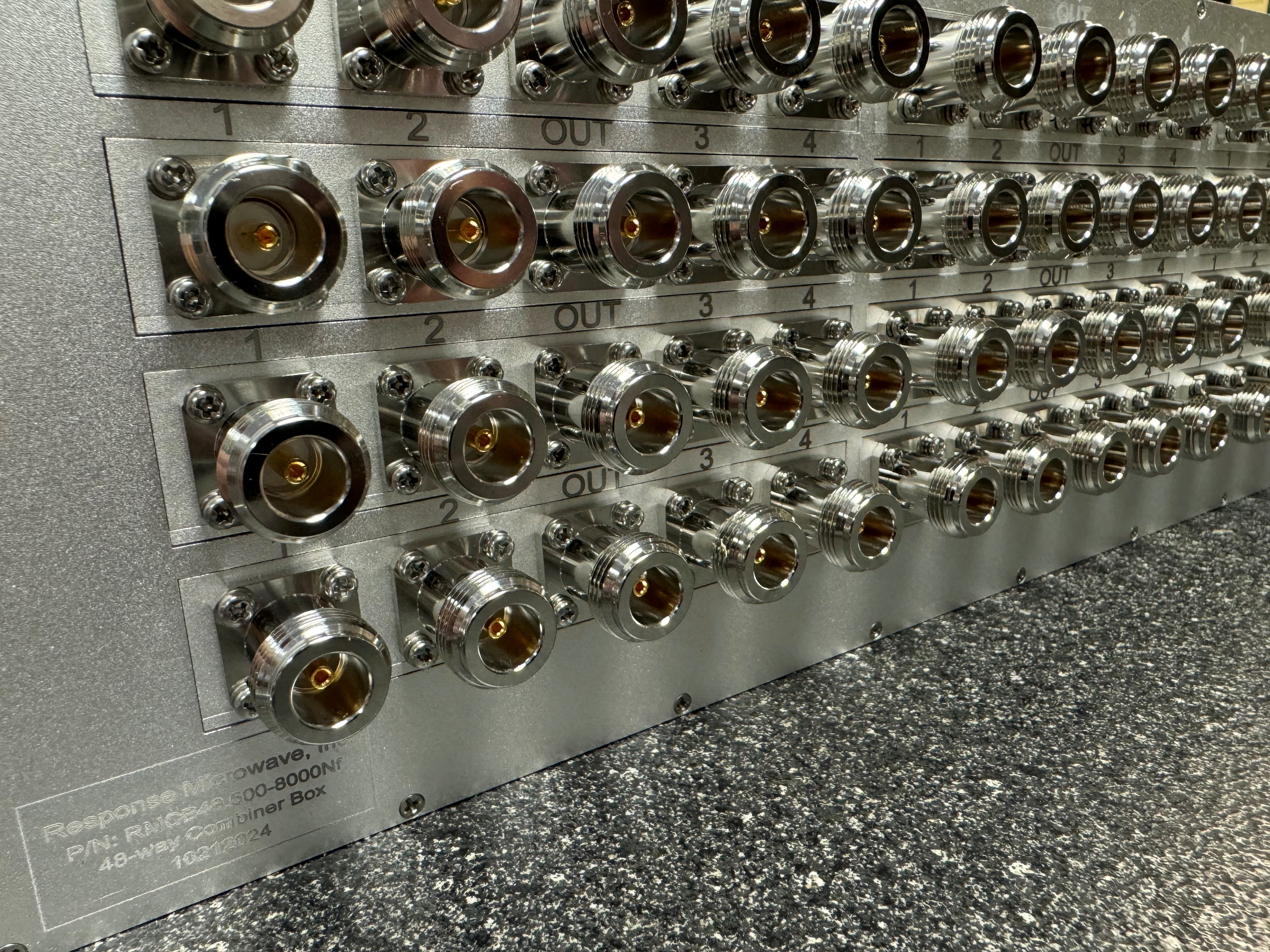 Custom 48-way RF combiner box built by Response Microwave, showing rows of N-type connectors